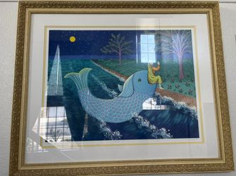 A famous painting measures 39 inches long and 32 inches wide.