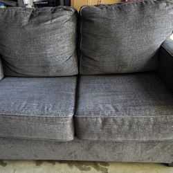dark grey one piece couch