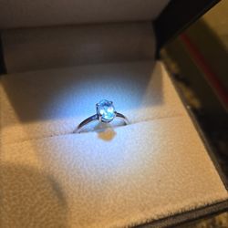 Angara silver ring with oval aquamarine 