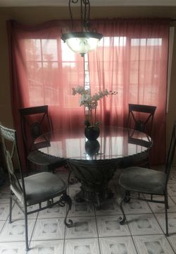 Metal table with glass top