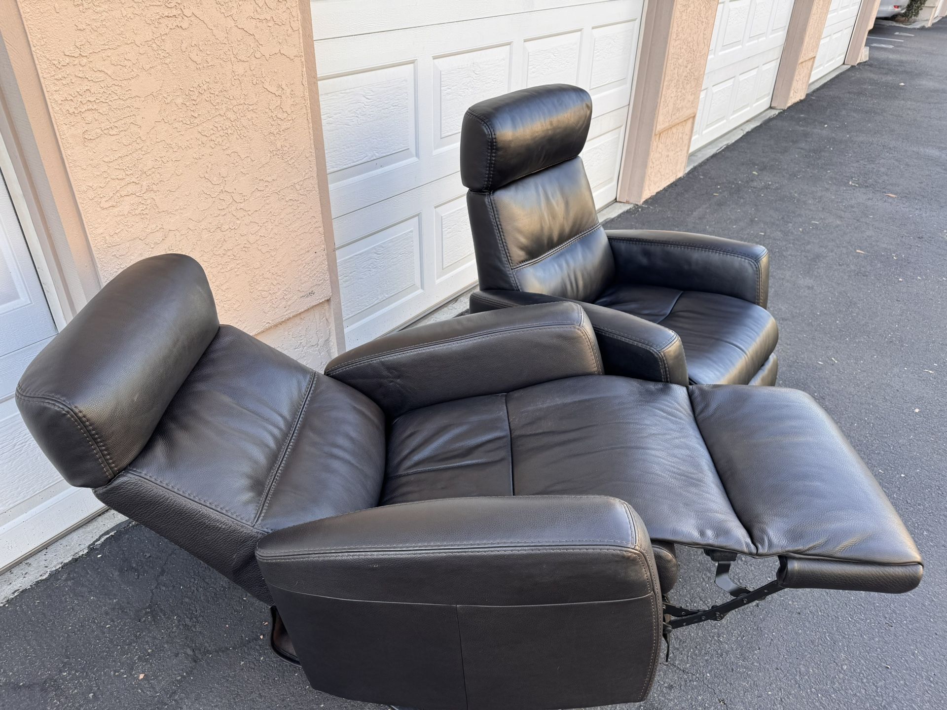 2 Leather ELECTRIC Reclining Rocking Chairs- Originally paid 3K for each new