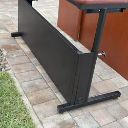 Wooden adjustable desk with keyboard tray on good condition