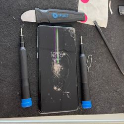 Shattered iPhone Screen Broken LCD Pixels 
