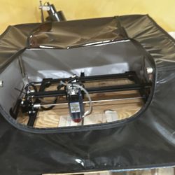 ORTUR Laser Engraver with upgraded Sculfun S9 module, cover, air assist tube installed and rotary.