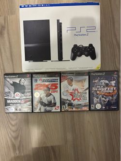 PlayStation 2 slim with  controller  + box+ manuals+ games+ cables (need gone asap)