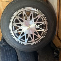 4 Rims and Tires Off A Lincoln Towncar