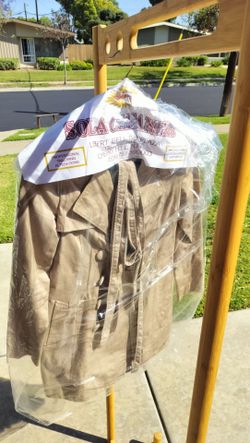 beige belted trench coat