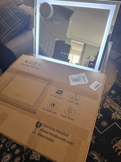 Make Up mirror with magnifying glass. 3 available each $25. Used 1x