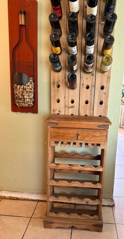 Mexican pine wine rack, which is a rustic, freestanding wooden unit