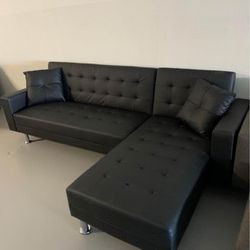 Brand New sectional,  reversible sleeper   Gray or black available