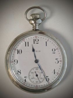 1914 Elgin Pocket Watch. 110 years old.  Size 16s.  7 Jewels. Works.  Has been running the whole time I am posting this ad, and seems to run strong, b