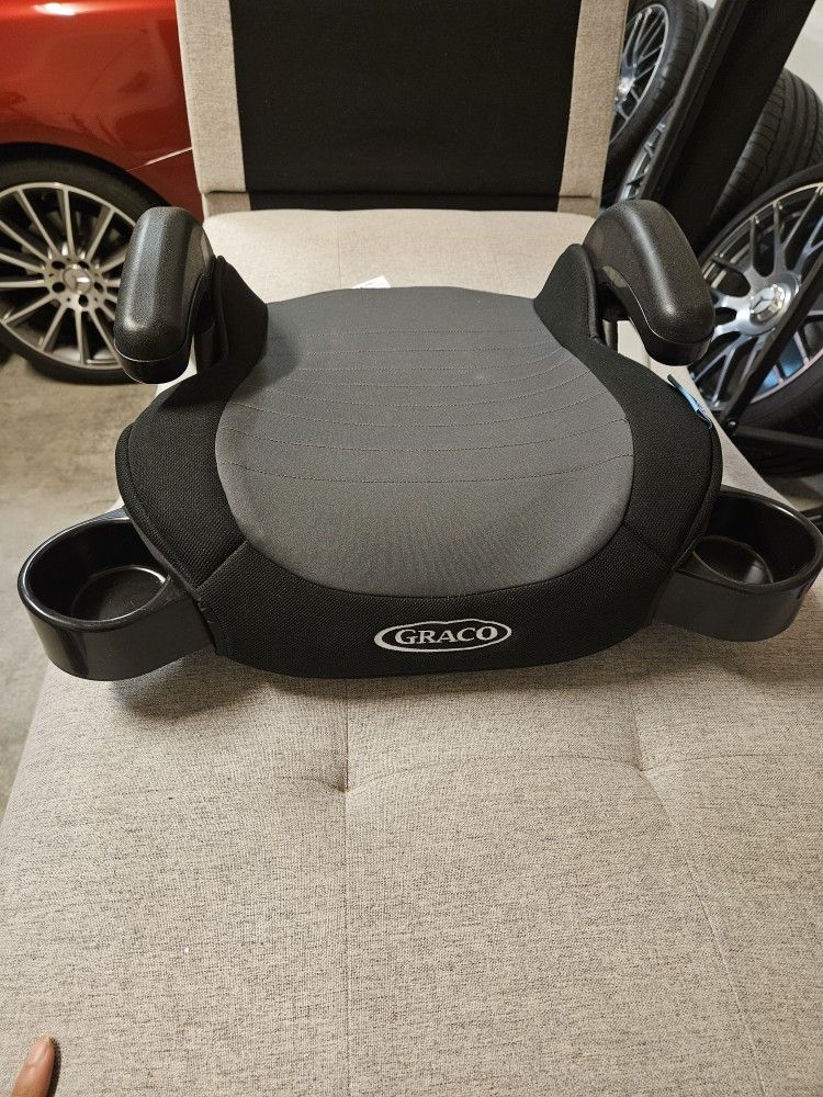 Graco Car Booster Seat / Free Play Doll With It