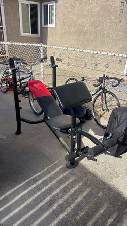 Bench press adjustable with leg attachments