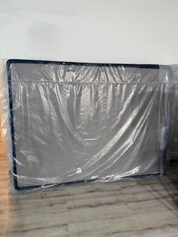 Seely queen size mattress box spring. New in the plastic