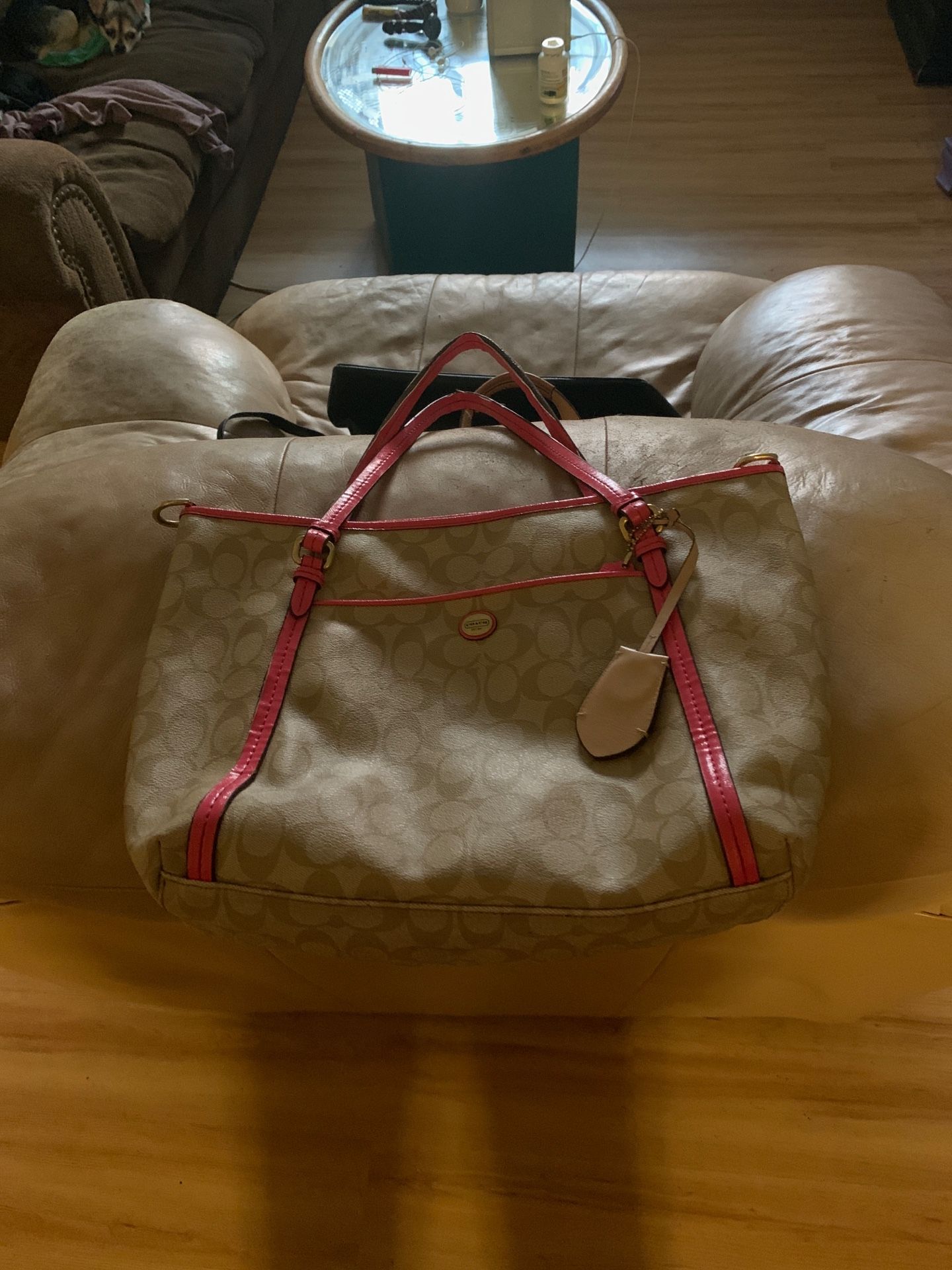 Pink and tan Coach purse