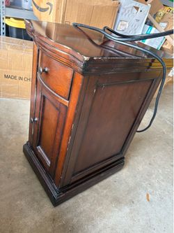 Bedside table with power outlet