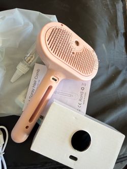 Pet spray hair comb