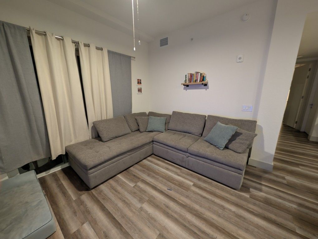 Pullout Couch With Detachable Chaise Lounges On Either Side