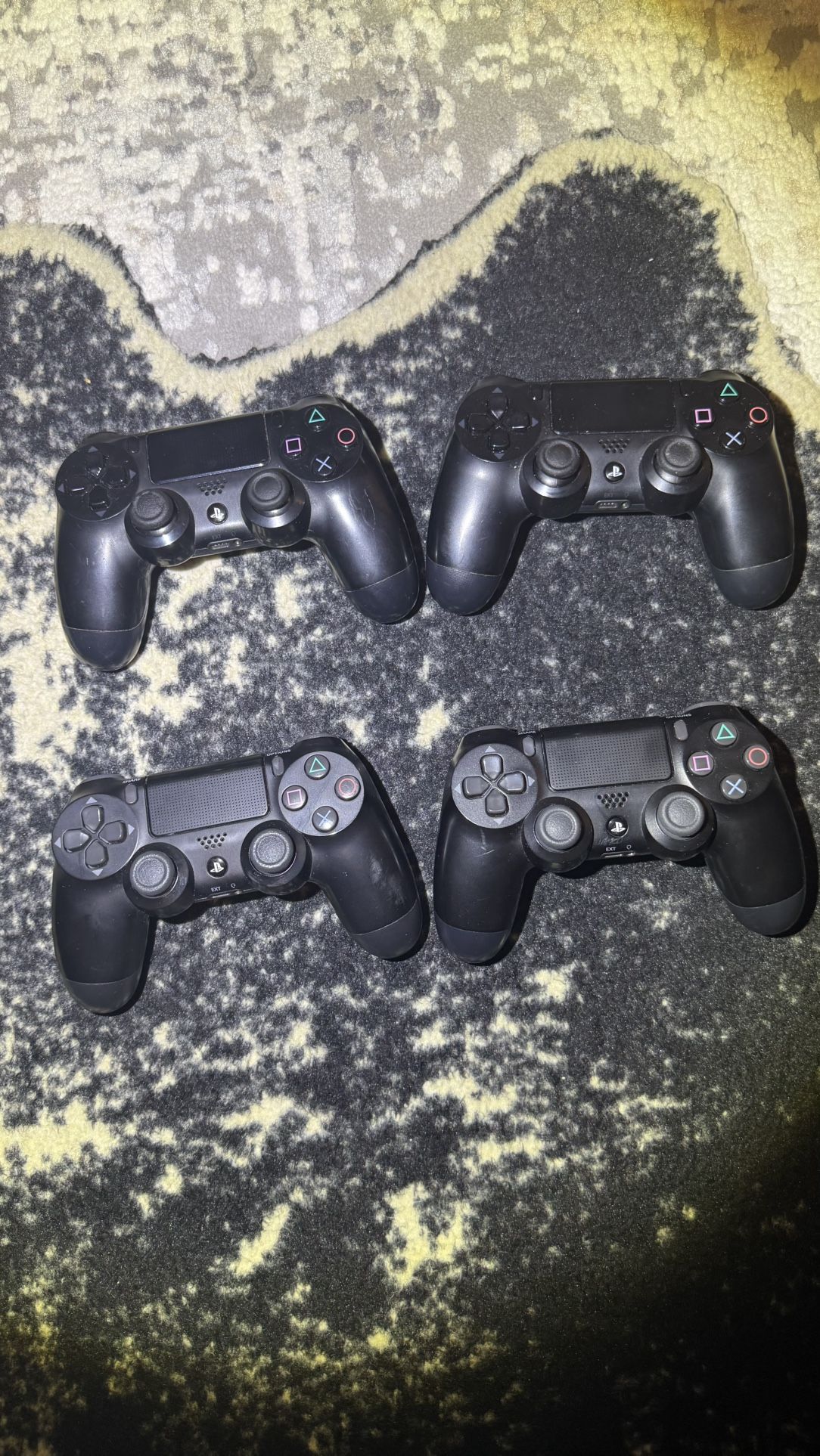 4 PS4 Controllers Good Condition