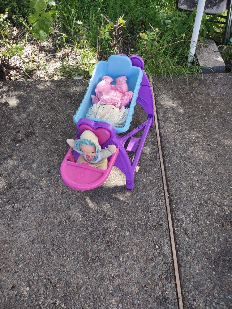 Baby's Toy Bassinet  Plastic You With Two Dolls.