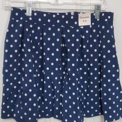 Navy blue and white polka dot mini skirt with zipper closure 