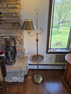 Vintage brass bridge floor lamp with a built-in tray table