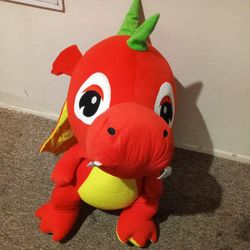 A STUFF DRAGON TOY.