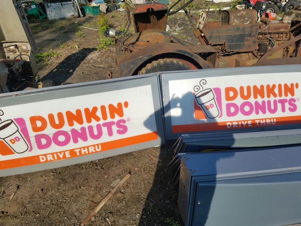 2 Dunkin Donuts signs