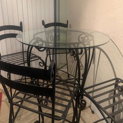 Wrought Iron Table and 4 Chairs 