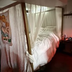 Canopy Bed Frame (comes with sheer curtains as well)