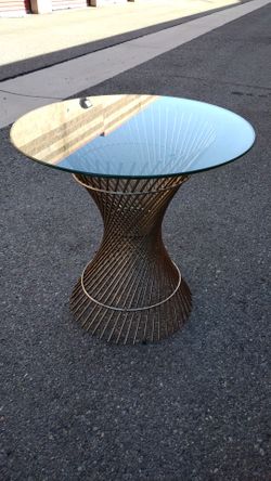 Modern Gold Wire Hourglass Accent Table - 17" Wide/24" High, with Glass Top 24"

Description
Add a touch of contemporary elegance to your home with th