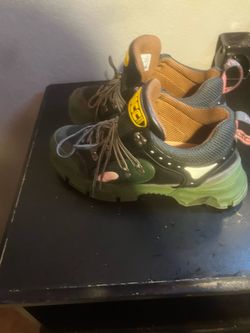 Gucci boots and Jordan 11s