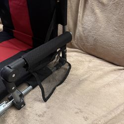 Folding stadium seat