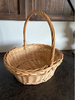 vintage-style round woven wicker gathering basket