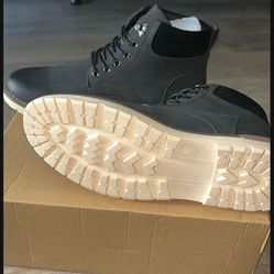 New , never worn Waterproof casual dressing Men boots ( 10 1/2) 