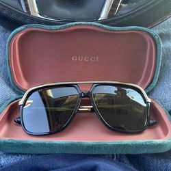Black Gucci glasses
