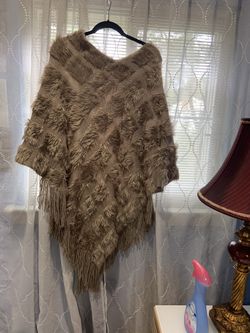Nice poncho in brown