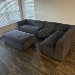 Grey Sectional Couch (28" H x 99" W x 66" D)