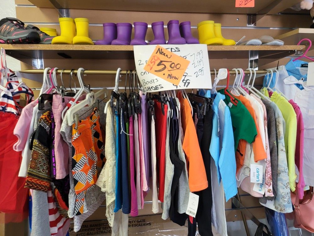 Children's rain boots $1 dollar children's clothing $1.25 Baby suit $5 each entire store 50% off