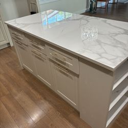 Kitchen Island 73inches By 34inches.  I Have A New One Just Like Pictured In The Box But Without The Counter Top.  Bought For $2000.00.