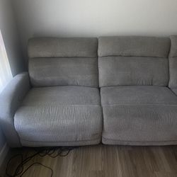 Grey sectional & Pillows