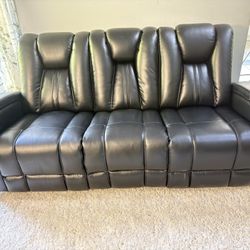 2 Power Black Leather Reclining Sofa (ask For Delivery For A Extra Fee)