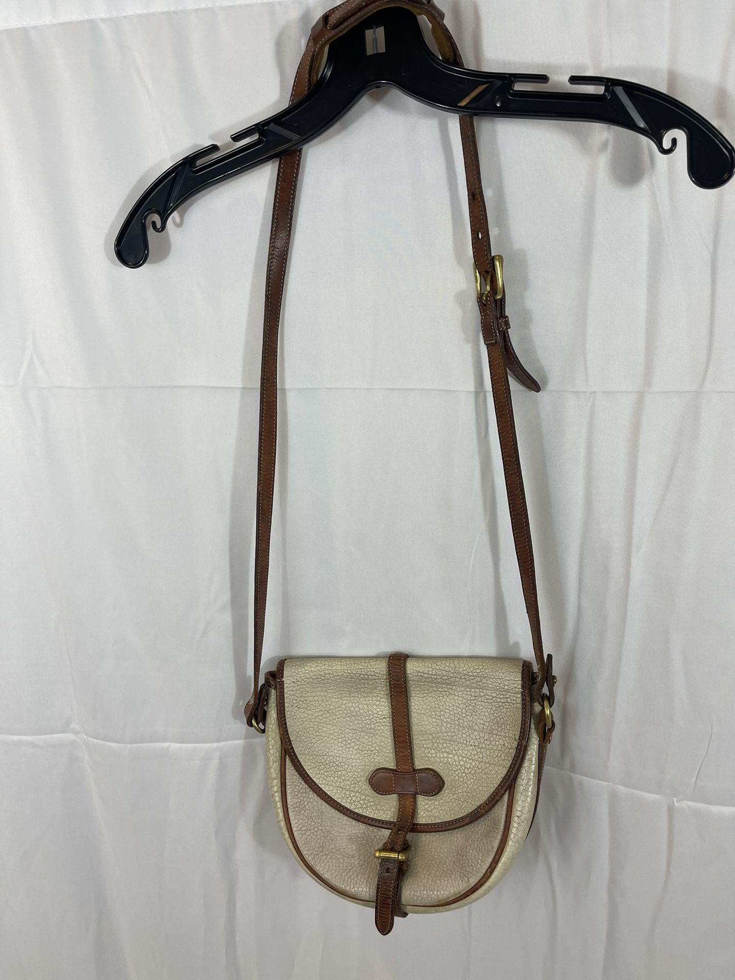 Dooney & Bourke 1980s Cream Pebbled Leather Crossbody Small Cavalry Saddle Bag