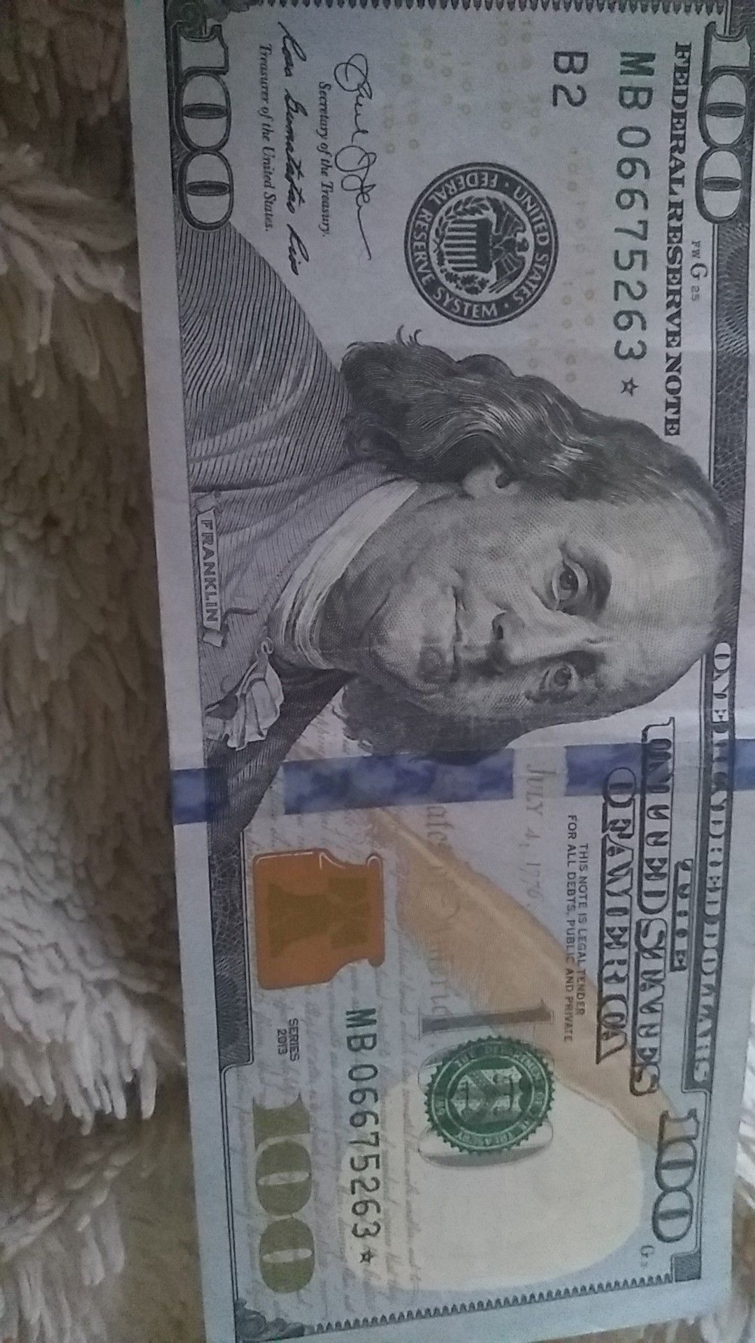 100$ bill with * serial code