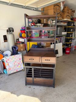 Dog kennel/crate with shelves.