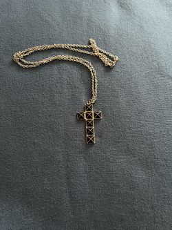 It’s A Beautiful cross with long chain it’s custom jewelry￼