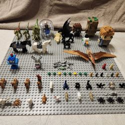 BUNCH OF LEGO ANIMALS, DINOSAURS, AND MORE