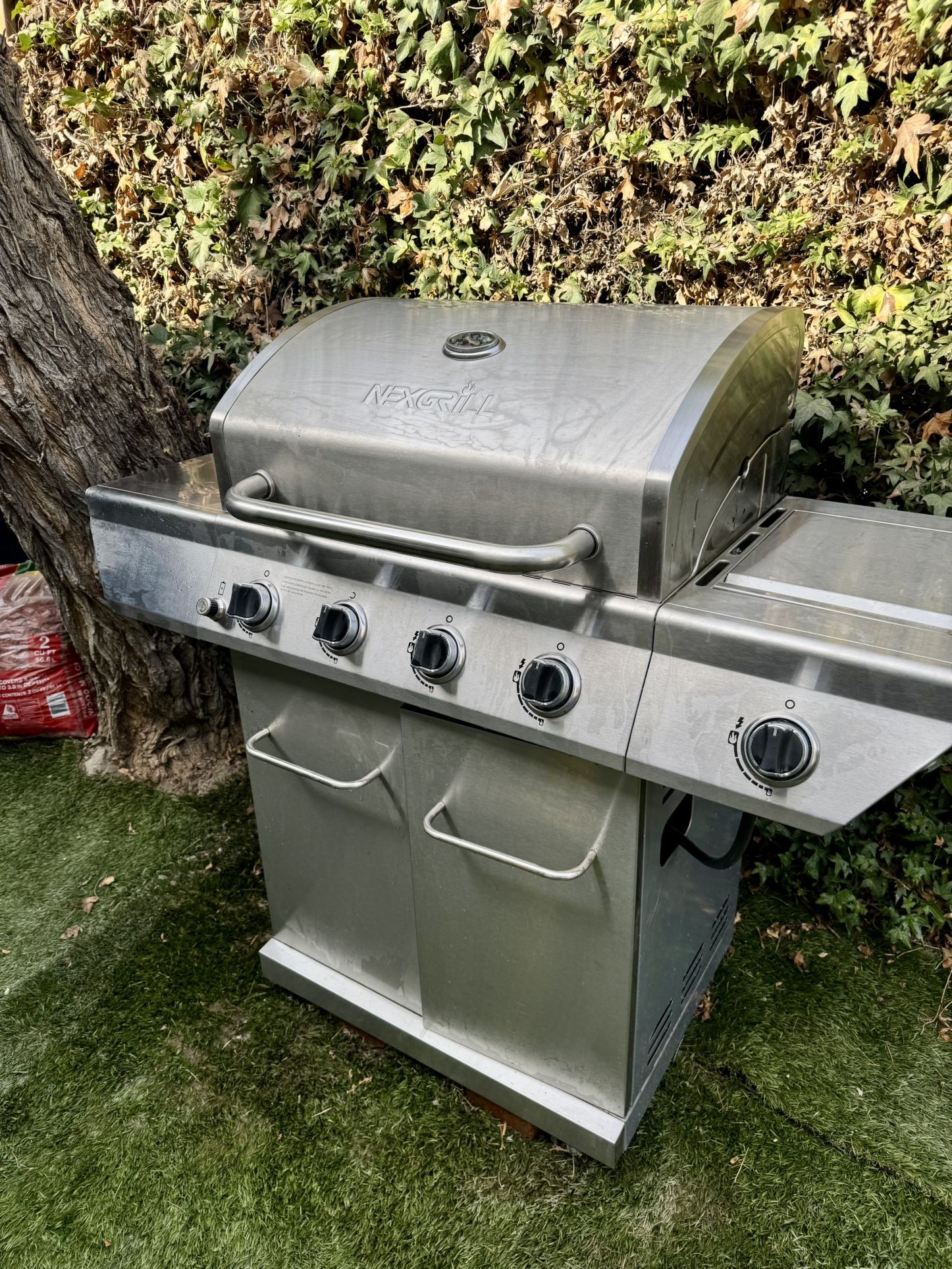 4-Burner Propane Gas Grill in Stainless Steel with Side Burner