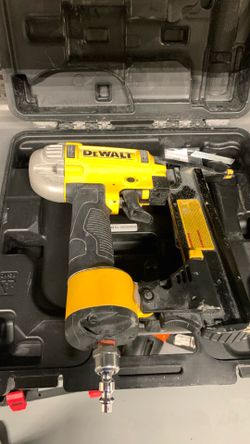 DEWALT DWFP12233 18-Gauge Precision Point Brad Nailer in a hard case.