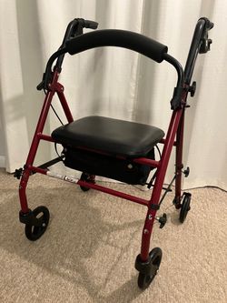 Lumex Foldable Seat Walker And Hand Breaks.